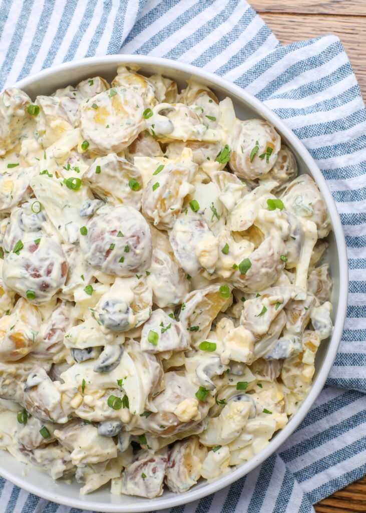 Fluffy Roasted Potatoes in a creamy potato salad are irresistible.