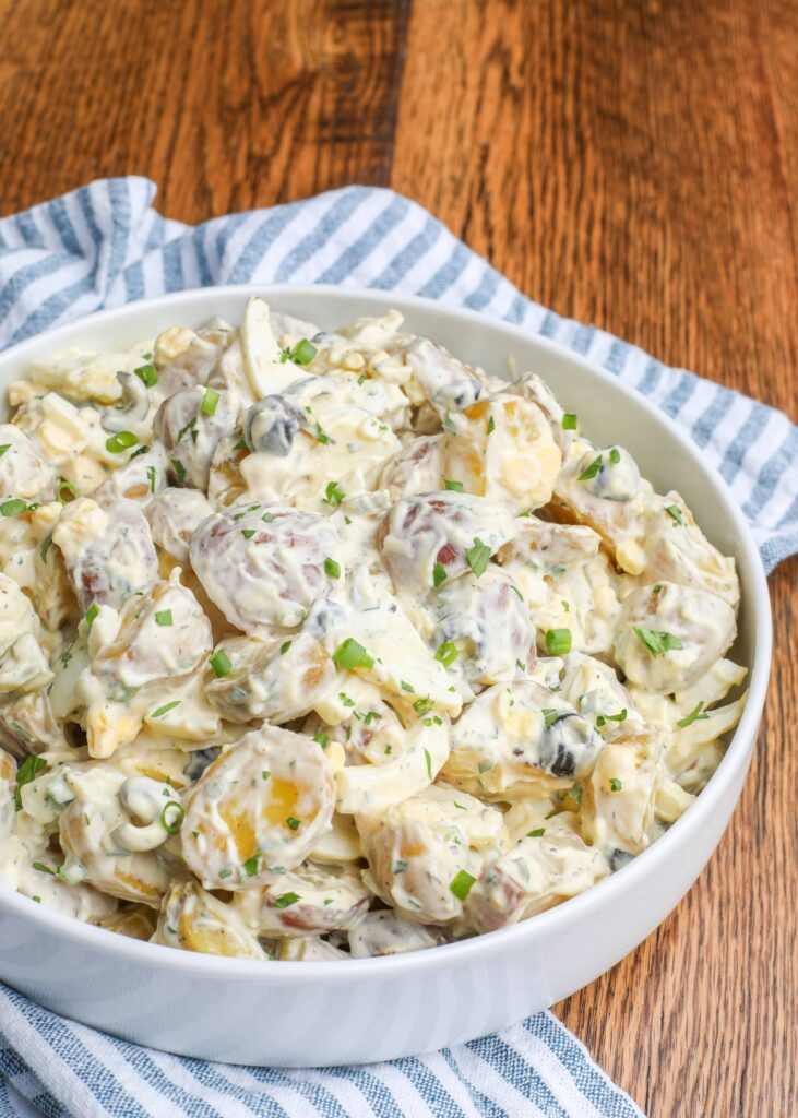 Creamy, tangy, potato salad made with roasted potatoes
