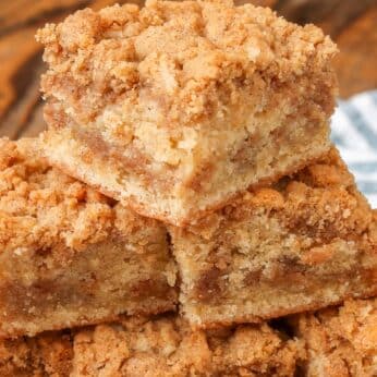 streusel coffee cake stacked on plate