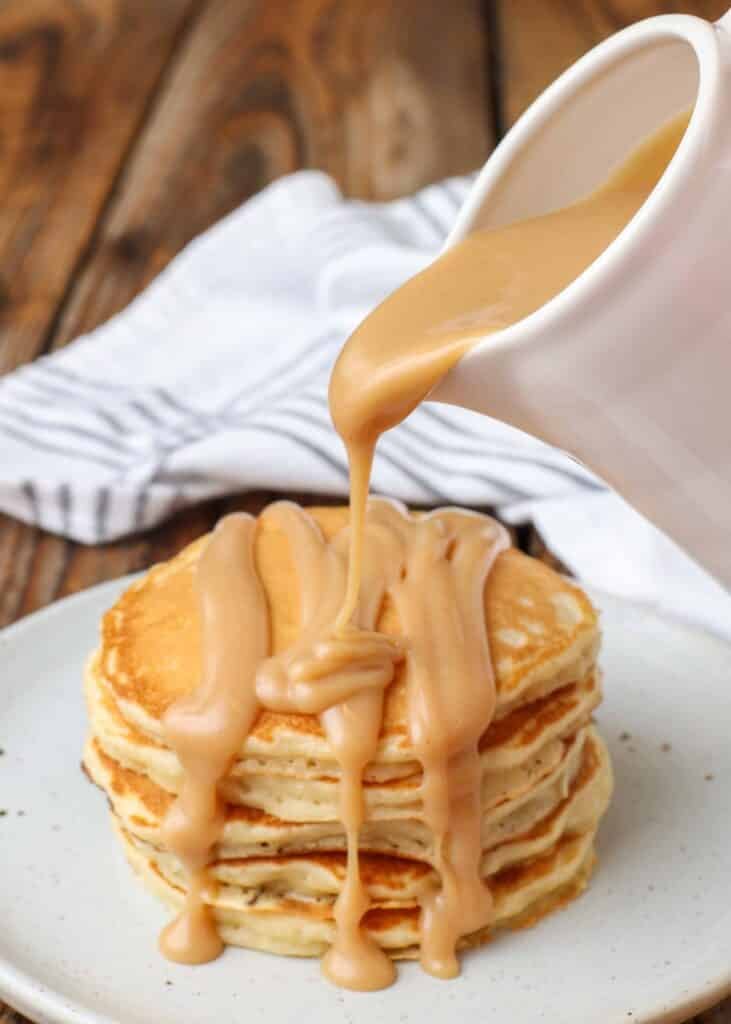 Pour creamy peanut butter syrup over pancakes