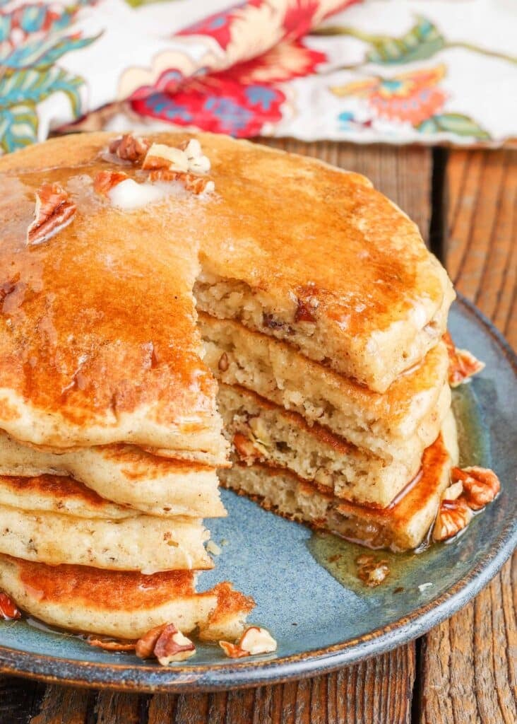 Fluffy pancakes sliced ​​on a plate