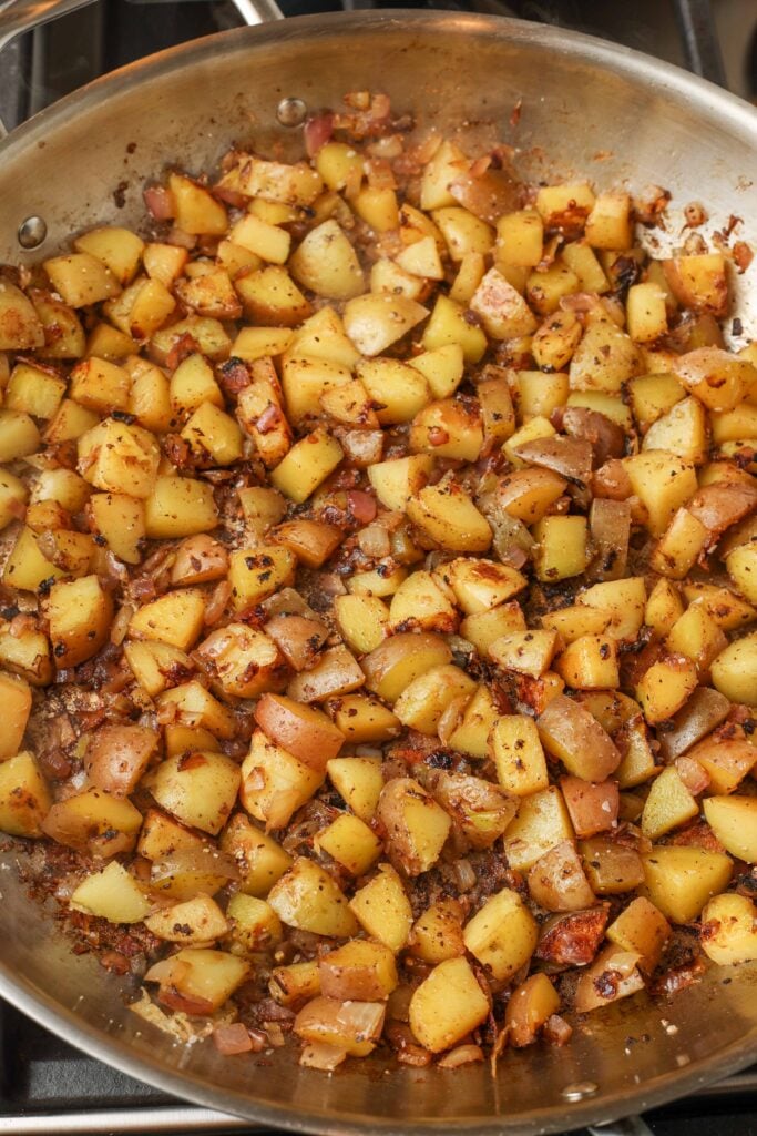 Breakfast potatoes in a large frying pan