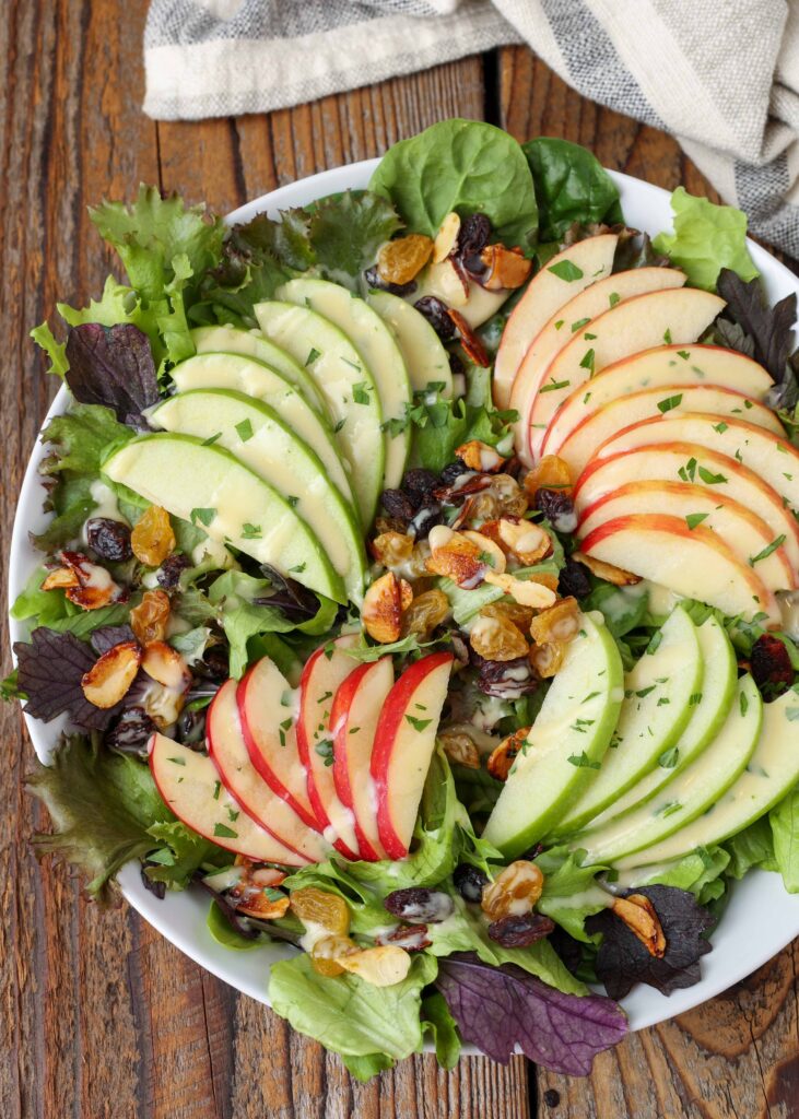 salad with spring mix, spinach, apples, craisins, and almonds