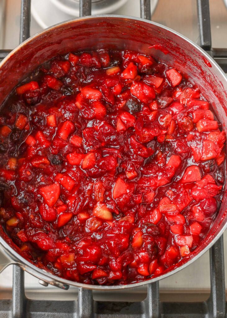 Apple cranberry chutney cooked in a skillet