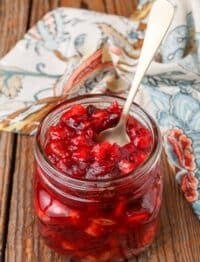 Cranberry Chutney with apples and raisins in jar