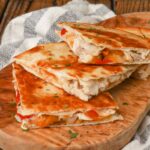 chicken quesadillas with bell peppers on board