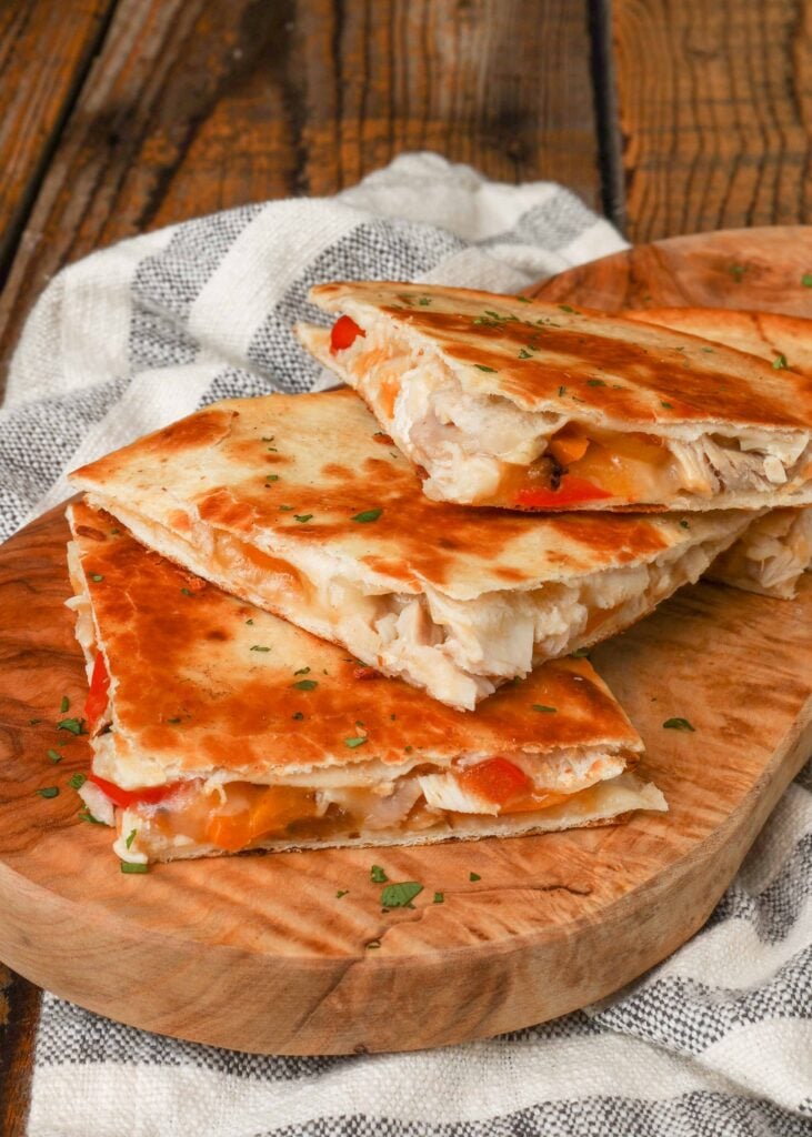 chicken quesadillas with bell peppers on board 