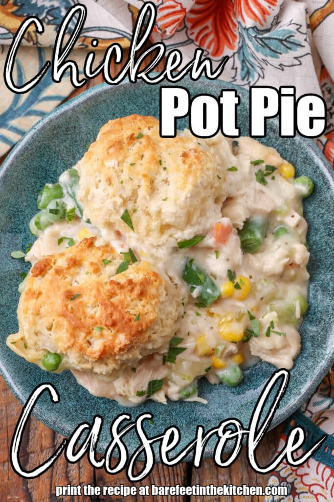 Chicken pot pie casserole on blue plate with floral towel 