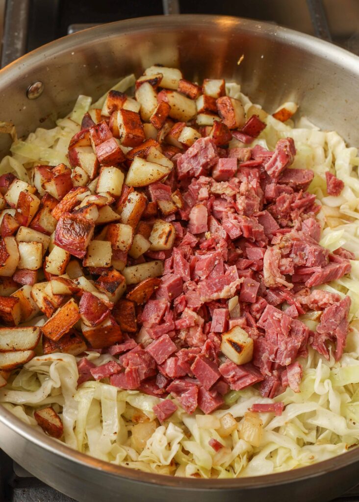 sauteed cabbage with crispy potatoes and corned beef