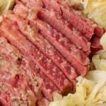 crockpot corned beef served with cabbage on platter