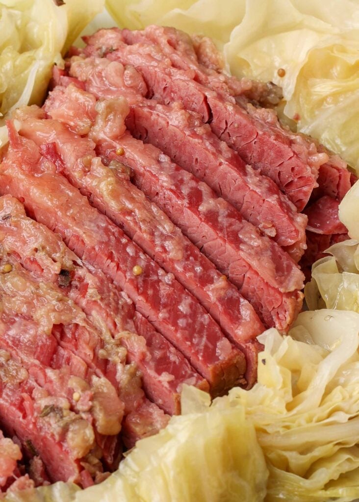 Crockpot corned beef with cabbage on a platter