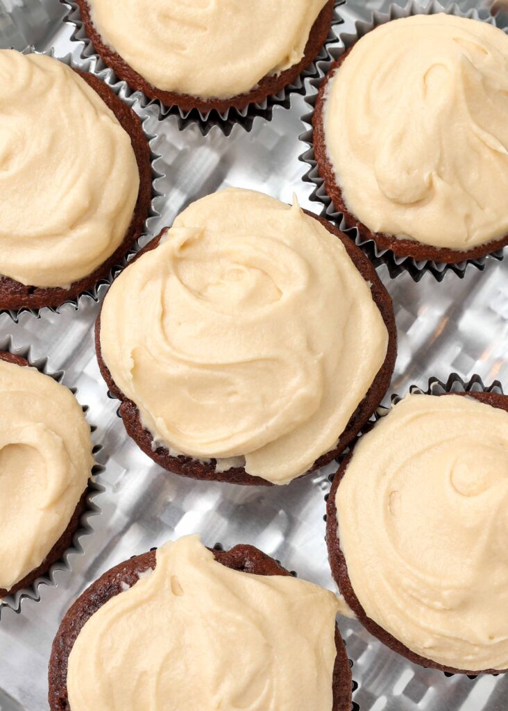 caramel frosting on chocolate cupcakes