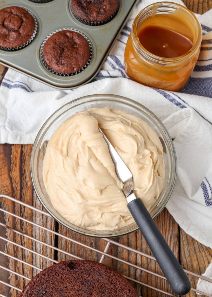 chocolate cupcakes with caramel sauce and frosting