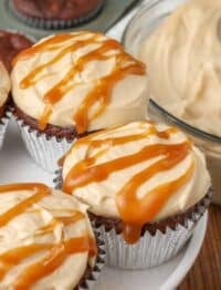 Caramel frosting with salted caramel sauce on chocolate sauce