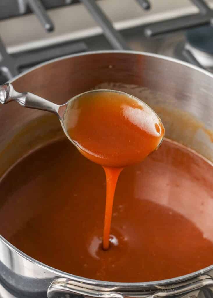 salted caramel sauce in a pot on the stove