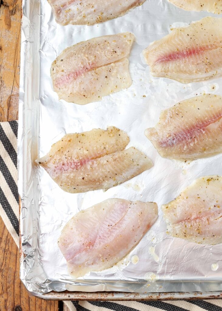 Tilapia on tray lined with foil