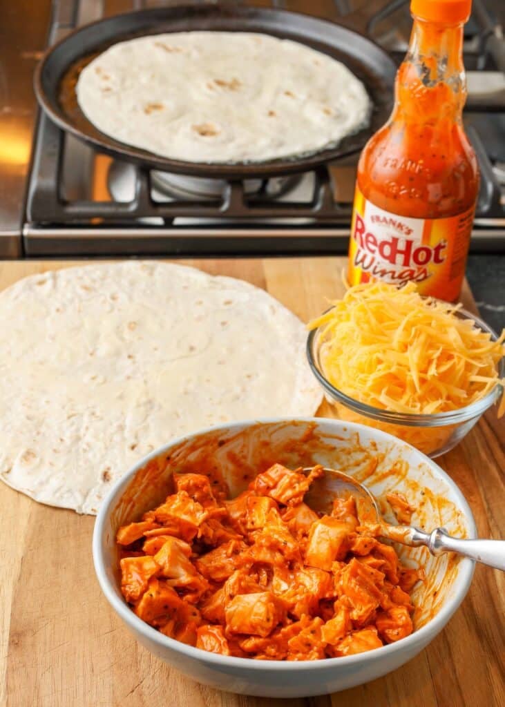 Buffalo Chicken Quesadilla with chicken and cheese uncooked