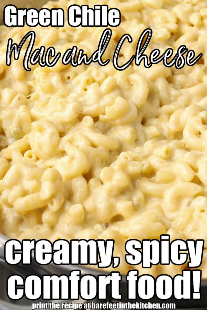 a close up of elbow noodles covered in creamy cheese sauce with green chiles. white text is overlaid the image, reading 