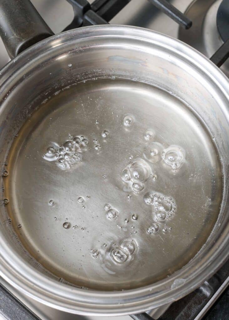 simmering sugar water on stove