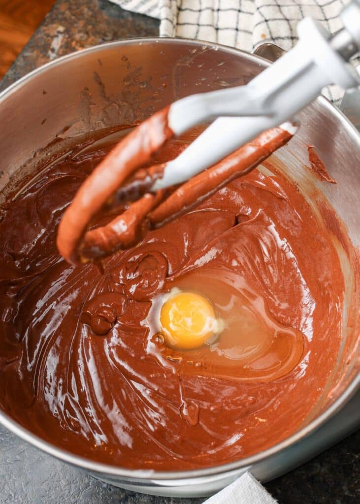 Beat the egg into the chocolate mixture
