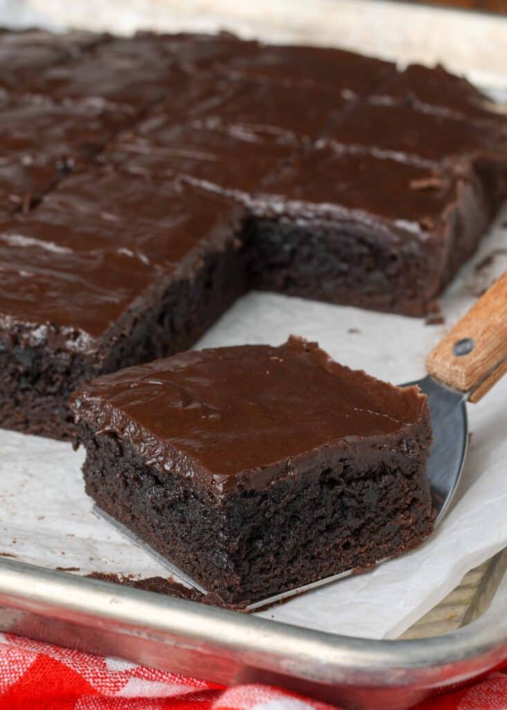 dark chocolate brownies on parchment lined tray