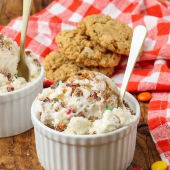 cookie ice cream in bowl with gold spoon