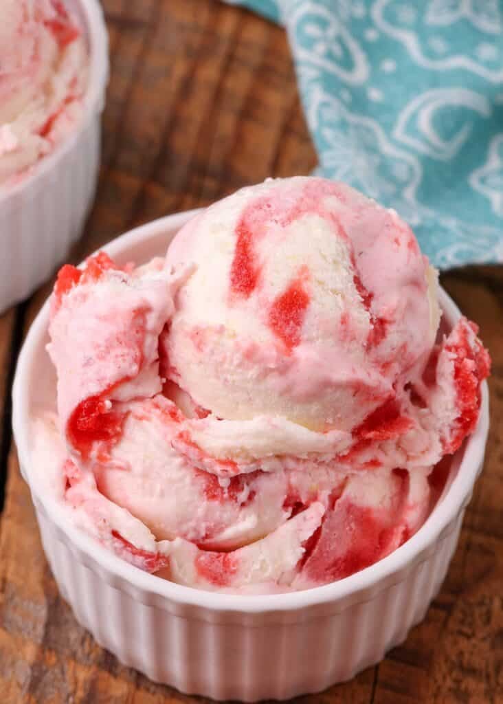 strawberry cheesecake swirl ice cream in white bowl