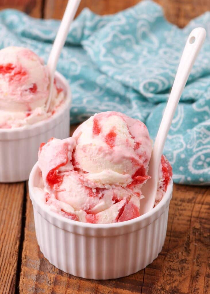 bowls of ice cream with strawberry swirl