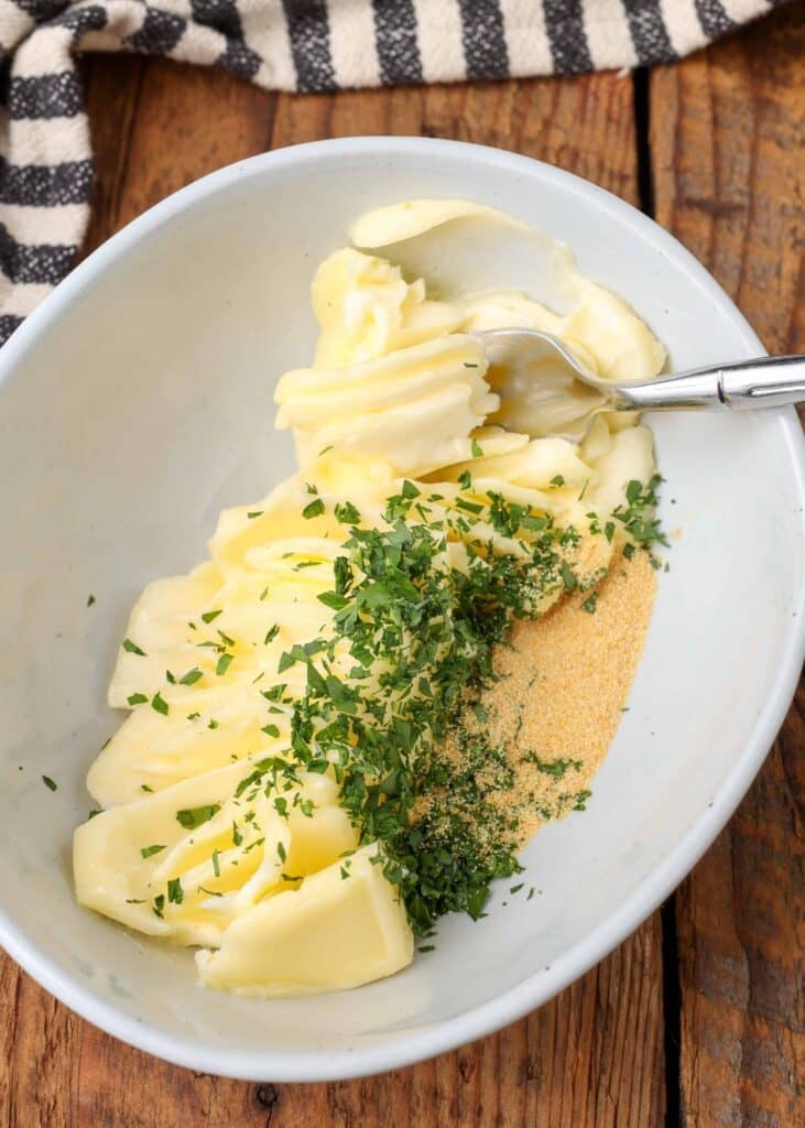 butter with garlic powder and parsley