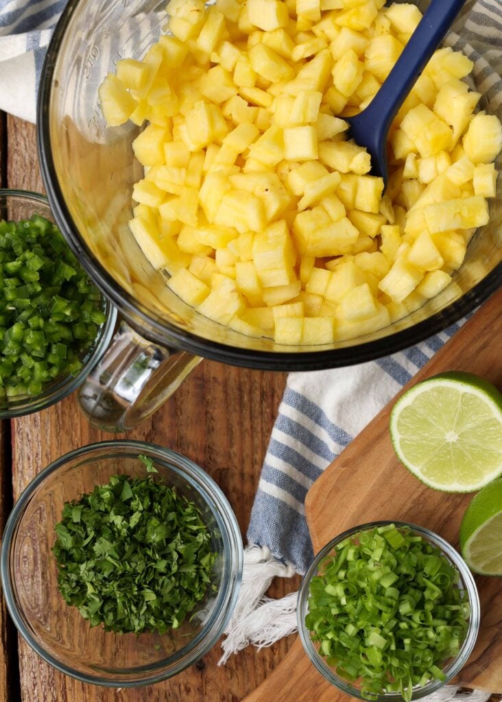 fresh pineapple with herbs and lime ingredient shot