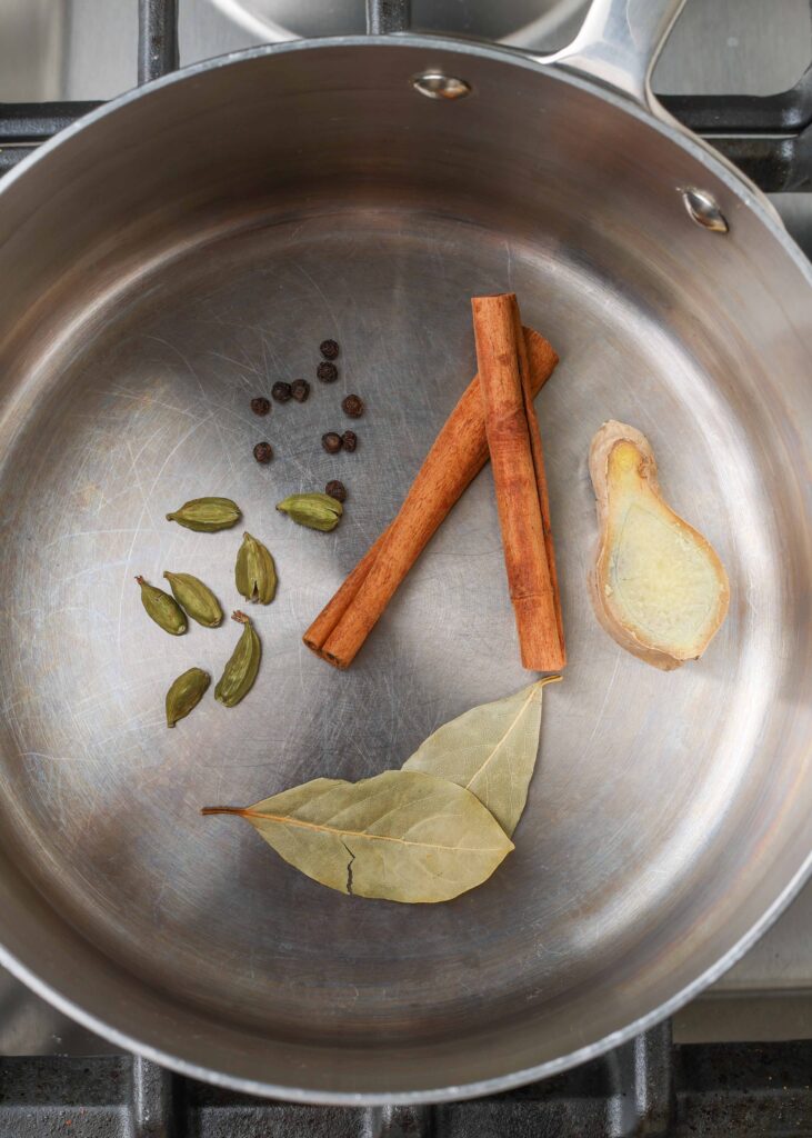Spices are placed in a medium sized pot to begin creating this ice cream