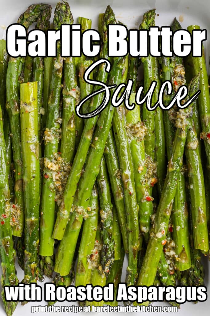 A top down photo of a pan of roasted asparagus is overlaid with white text that reads, "Garlic Butter Sauce"