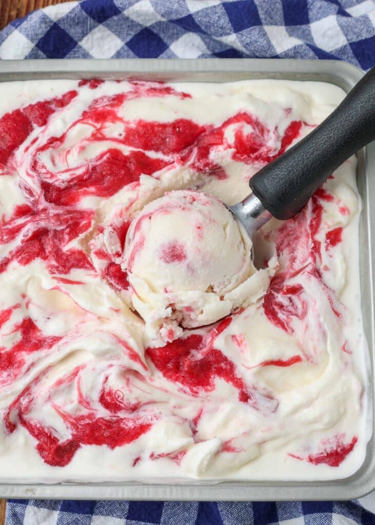 Close-up shot, scooping rhubarb ice cream from a sheet pan