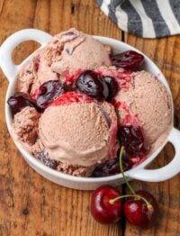 close up of Chocolate Cherry Ice Cream in bowl with roasted cherries on top