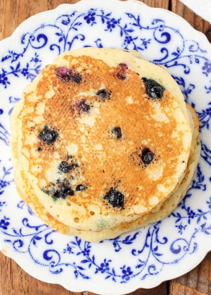 blueberries are visible in these buttermilk pancakes on a plate