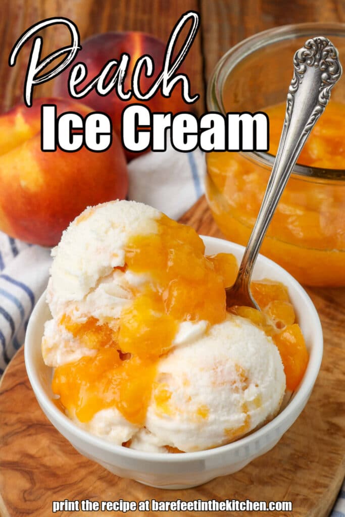 Vertical shot of peaches and cream ice cream, served in a white bowl with a silver spoon