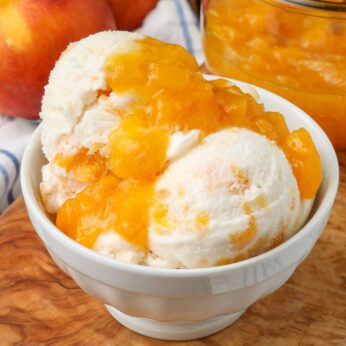 Horizontal shot of peaches and cream ice cream, served in a white bowl