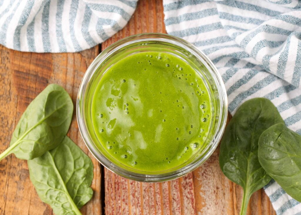 green smoothie with mango, banana, and spinach