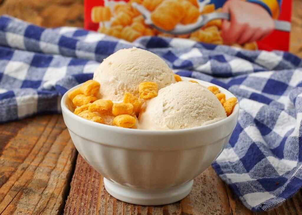 Horizontal close-up of Captain Crunch Ice Cream topped with Captain Crunch cereal
