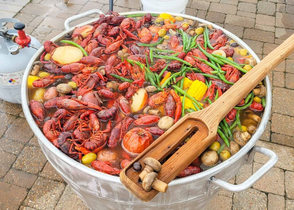 close up of louisiana boil with crawfish and vegetables