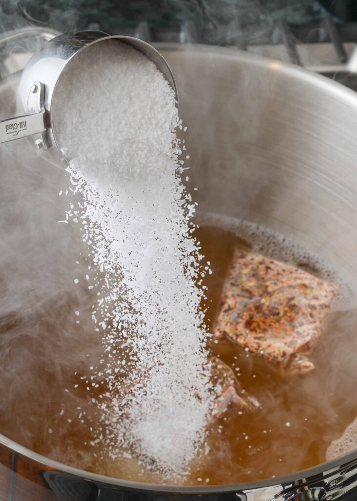 Adding salt to pot