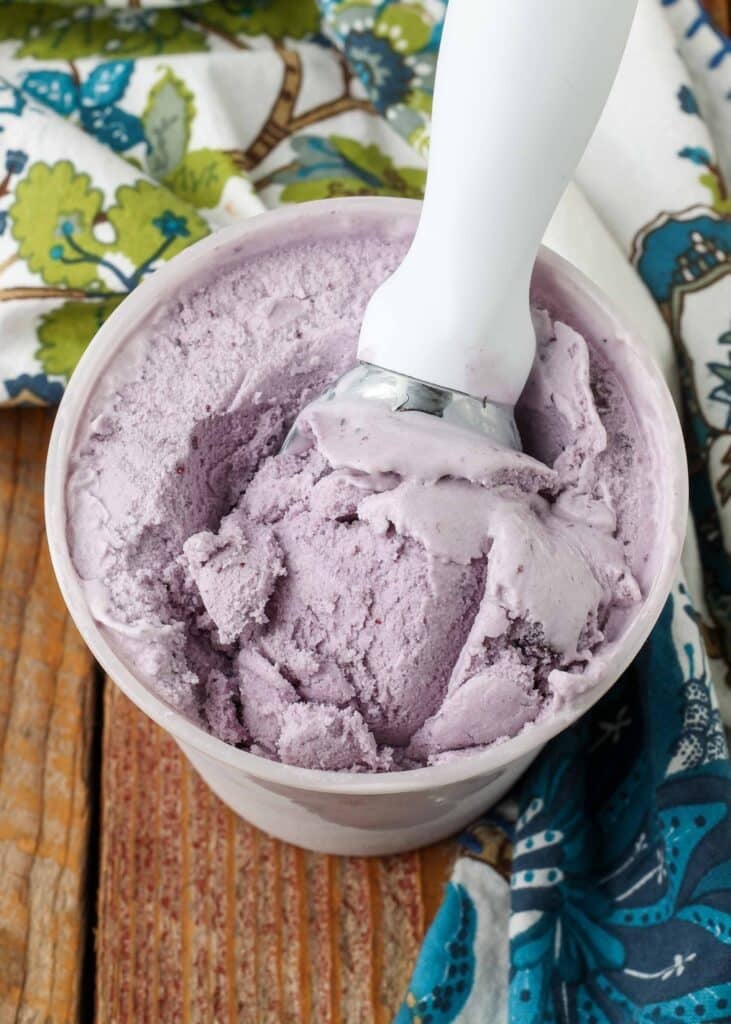 Scooping blueberry gelato
