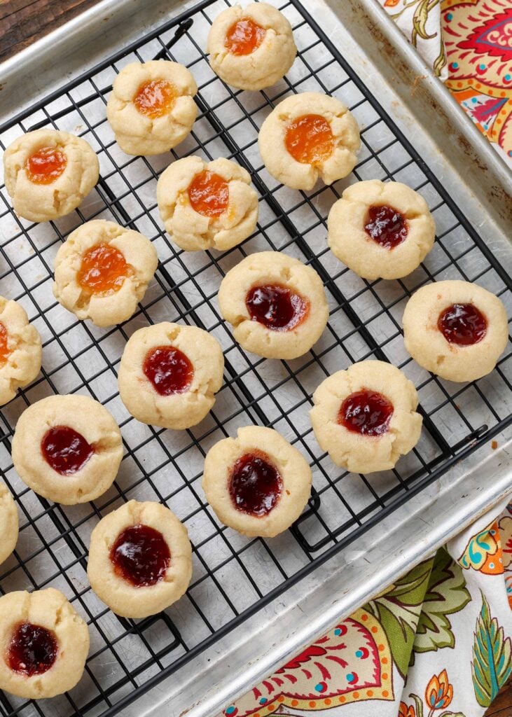 jam thumbprint cookies on wire cooling rack