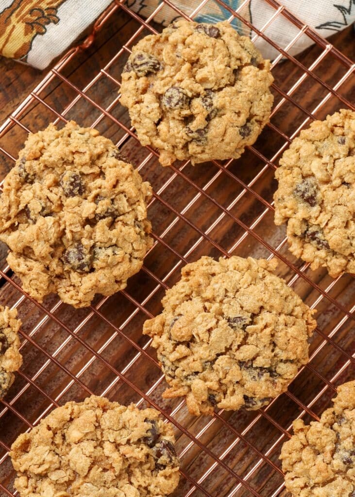 Overhead shot of gooey cookies cooling on baking rack