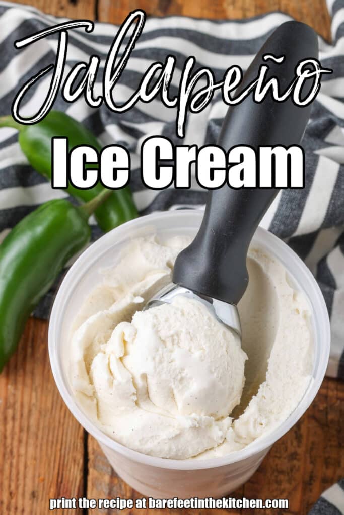 scoop of ice cream in container next to jalapenos on table