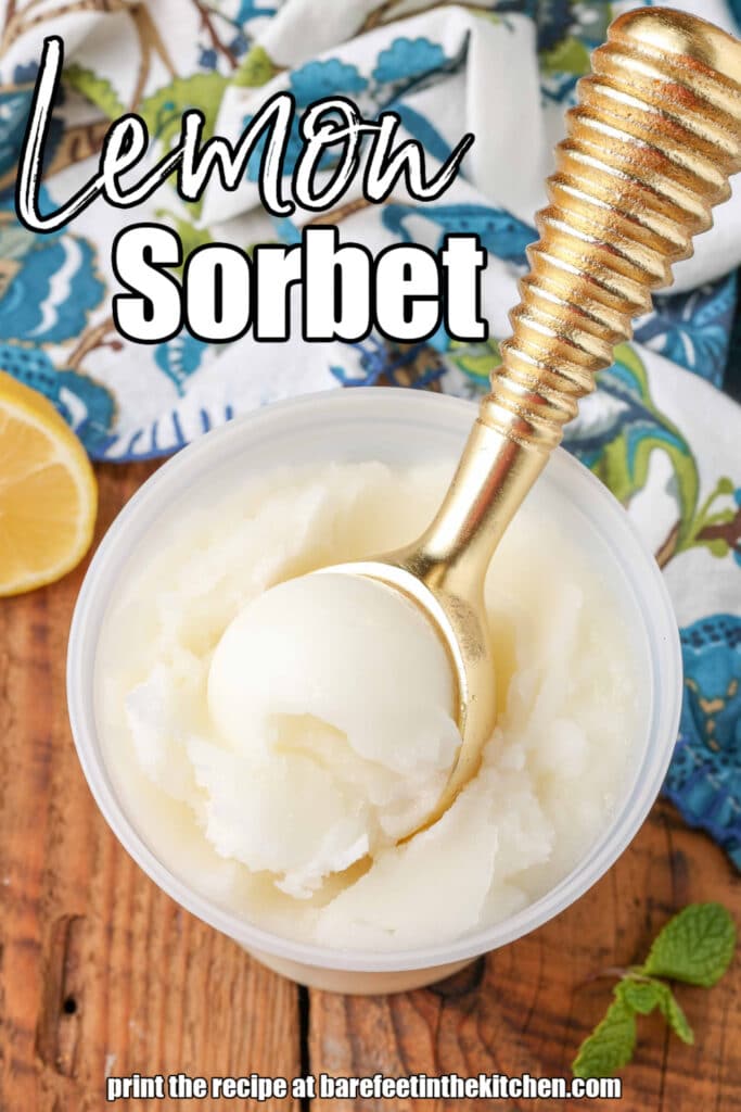 golden ice cream scoop with lemon sorbet container