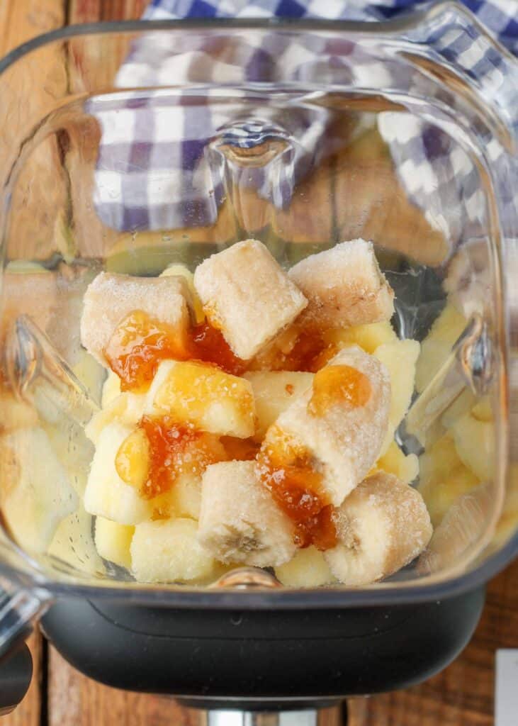 the pineapple chunks and other ingredients have been added to the blender.