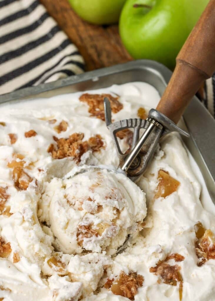 close up of apple ice cream with chunks of crisp topping