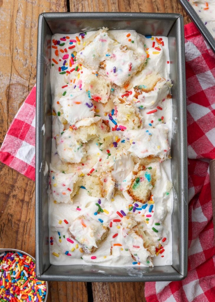 cake chunks in pan of ice cream