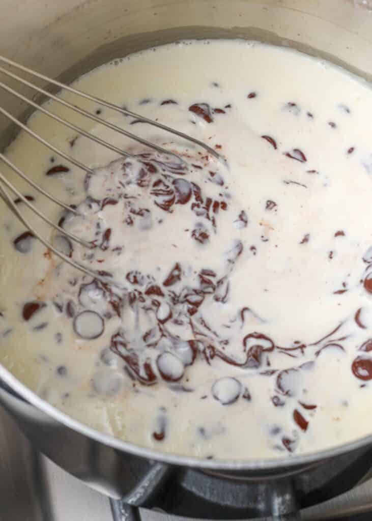 cream and chocolate in saucepan